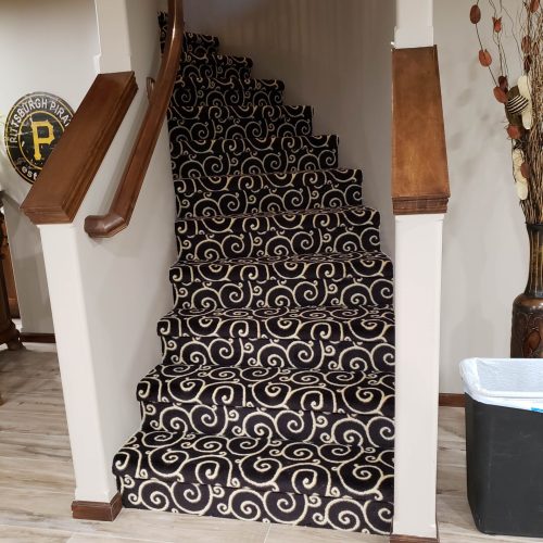 luxury vinyl plank and stair carpet